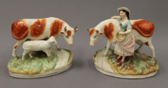 Two 19th century Staffordshire cow groups. The largest 21 cm high.