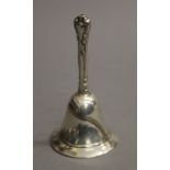 A small sterling silver table bell. 10 cm high. 65.1 grammes.