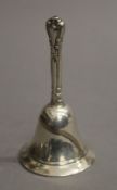 A small sterling silver table bell. 10 cm high. 65.1 grammes.