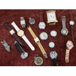 Collection of various assorted wristwatches, a small brass cased carriage type clock,