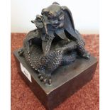 Large bronze Chinese stamp/seal, the top crested with a figure of an entwined dragon, with signature