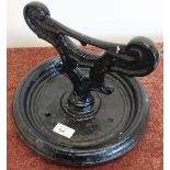 Victorian cast metal boot scraper on circular base