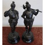 Pair of 19th/20th C Spelter figures of a continental style armoured axe-man, on turned ebonised