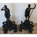 Extremely elaborate large pair of bronze and cast metal country house style fire dogs in the form of