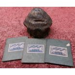 Unusual carved wood and papier-mache money box in the form of a hay stack marked LMS, and three