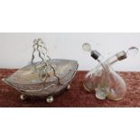 Cut glass and sliver plated condiment dish with lift off lid, and a glass twin cruet with silver