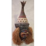 Unusual African style tribal witch doctor's head mask with carved face and hessian type beard,