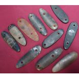 Collection of various vintage steel, horn and composite shotgun butt plates