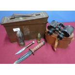 5.56 ammunition tin, cased pair of binoculars, a small sheath knife, an american style combat knife,