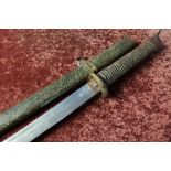 Japanese Samurai type sword with 28 1/2 inch slightly curved blade with traces of engraved detail,