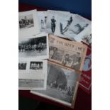 Three boxes containing a quantity of military reference material and ephemera, including large