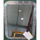 Large polished metal ship port hole fitted with mirrored panel from RMS Windsor Castle, with