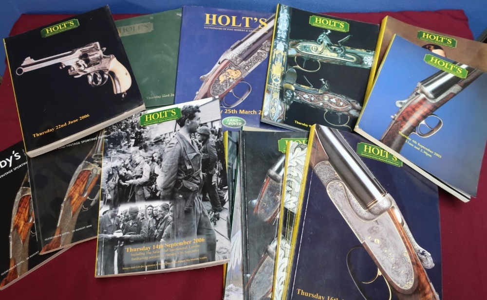 Collection of sixteen Holts gun catalogues, including 25th March 2010 hardback catalogue, and four