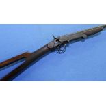 Belgium side lever opening .410 folding action shotgun with sectional stock and 23 3/4 inch