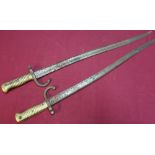 Two French 19th C bayonets with brass grips
