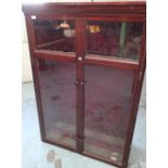 Early 20th C mahogany cased sectional gun cabinet with two glazed panels above two glazed cupboard