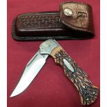 Ridged RG73 American pocket knife with 3 inch folding bade and leather belt pouch