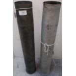 Pair of Russian type alloy artillery shell casings, with various markings to the side and stamp to