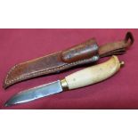 Brusletto sheath knife with 4 inch blade, carved wooden grip and leather sheath
