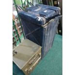 Military style rectangular metal packing crate with lift up top and internal racking, cream metal