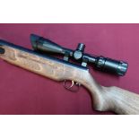 Weihrauch HW35K .22 air rifle with sound moderated barrel and Walther 3-9x44 scope