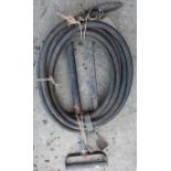 Circa WWII stirrup, pump and hose, with patented `Pull' crowned GR cypher