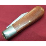 Two bladed pocket knife with wooden grip
