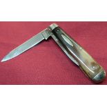 Two bladed pocket knife by William Rogers of Sheffield, with two piece polished horn grips