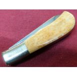 Small twin bladed pocket knife with polished horn grips