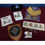 Selection of British Army regimental cap badges for various Dragoon Guard regiments including the