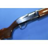 Remington Model 1100 12 bore semi auto shotgun with 25 inch barrel and 13 3/4 inch pistol grip