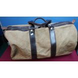 As new Holland & Holland leather trimmed and canvas holdall type bag with additional shoulder
