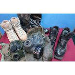 Pair of British Army issue Lowa dessert boots, various other military boots and two haversacks