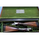 Cased pair of William Evans 12 bore side by side ejector shotguns with 28 inch barrels and 14 3/4