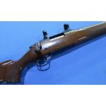 Remington model 700 .243 bolt action rifle, with screw cut barrel for sound moderator and scope ring