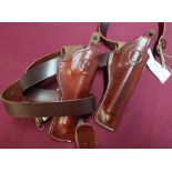 Two as new Deben leather pistol holsters and belts (2)