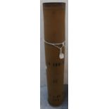 Large artillery shell casing with various markings including CN-100-53E1 LOT 1.BR.78ACU (height