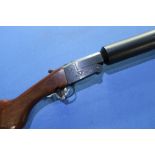 Gunsport 12 bore hush power shotgun with folding action and 31 1/2 inch silenced barrel, serial