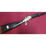 Remington Rolling Block Carbine Rifle with 24 1/5 inch barrel, fixed fore sight and half stocked