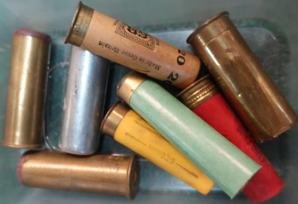 Belgium Browning steel cased 12 bore shotgun cartridge, two Nobel Glasgow brass cased 12 bore