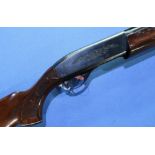 Left handed Remington Model 1100 2 bore semi auto shotgun with 25 1/2 inch barrel and 14 inch pistol