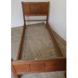 Acorn man oak single bedstead with paneled detail to the head and foot boards maximum width 100cm to