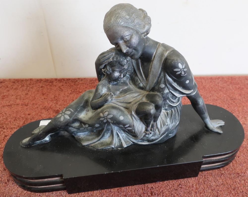 Art Deco figure with cast metal seated lady and child on marble base (41cm x 14cm x 28cm)