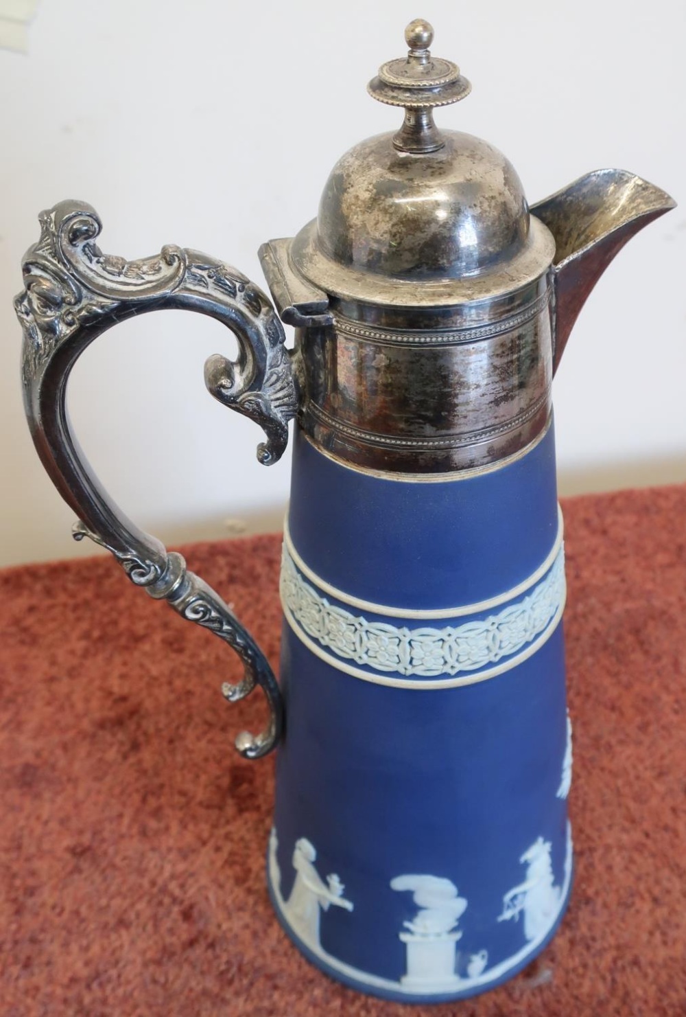 Wedgwood Blue Jasperware claret style jug with hinged top (height 29cm)