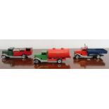Three tri-ang minic tinplate clockwork vehicles, including dust cart, tanker and flat bed truck (3)