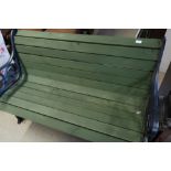 Garden bench with cast metal supports and painted wooden slats (width 132cm)