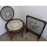 Circular top occasional table with inset needlework panel with similar twist handle and circular