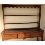 18th/19th C oak dresser with three tier removable raised back above three drawers to the base with