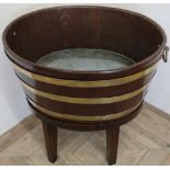 Large oval twin handled brass coopered oak planter with lift out tin and tray on separate later