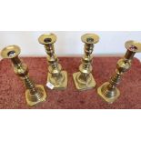 Two pairs of brass candlesticks on square bases (approx height 27cm)